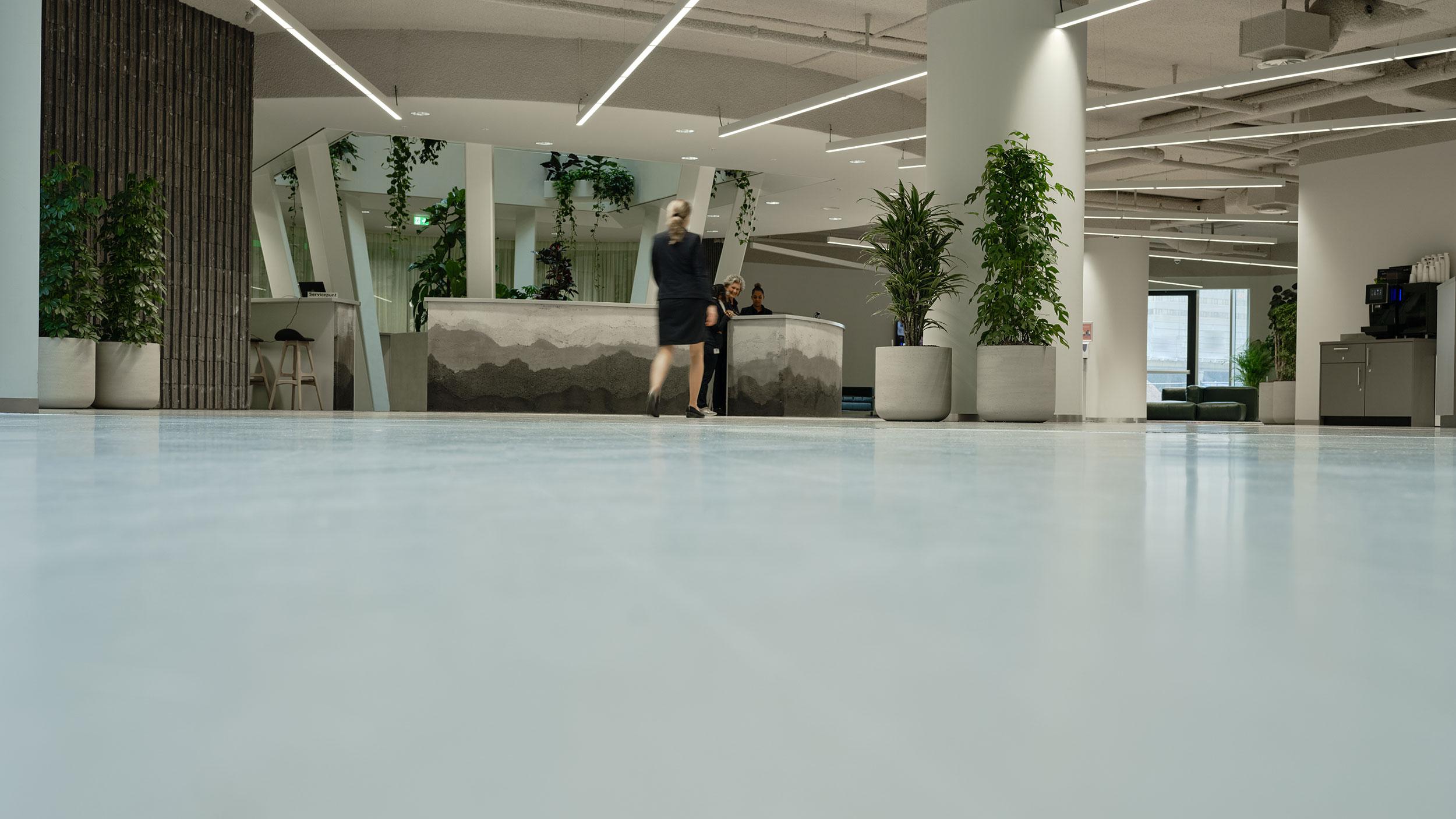 Modern office workspace with Acosorb acoustic ceiling and wall solutions